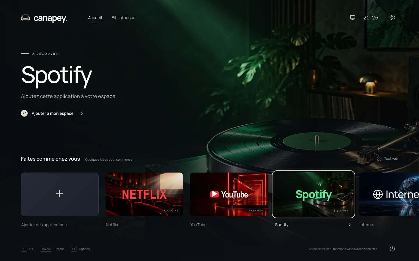Canapey: selecting the Spotify suggestion displays a green-toned turntable backdrop.